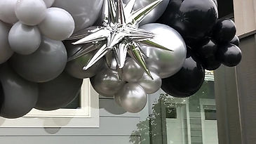 Surprise Birthday Balloon Garland on house
